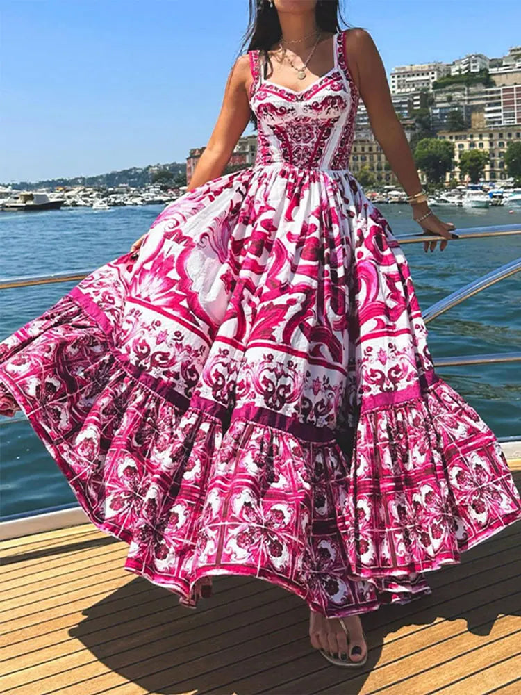 "Imagem do Vestido Feminino Longo Estampado em vermelho, com estampa floral marcante e caimento sofisticado, perfeito para eventos especiais e uso diário."