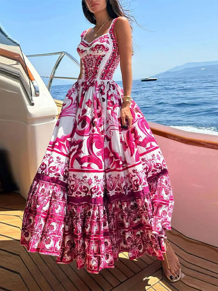 "Imagem do Vestido Feminino Longo Estampado em vermelho, com estampa floral marcante e caimento sofisticado, perfeito para eventos especiais e uso diário."